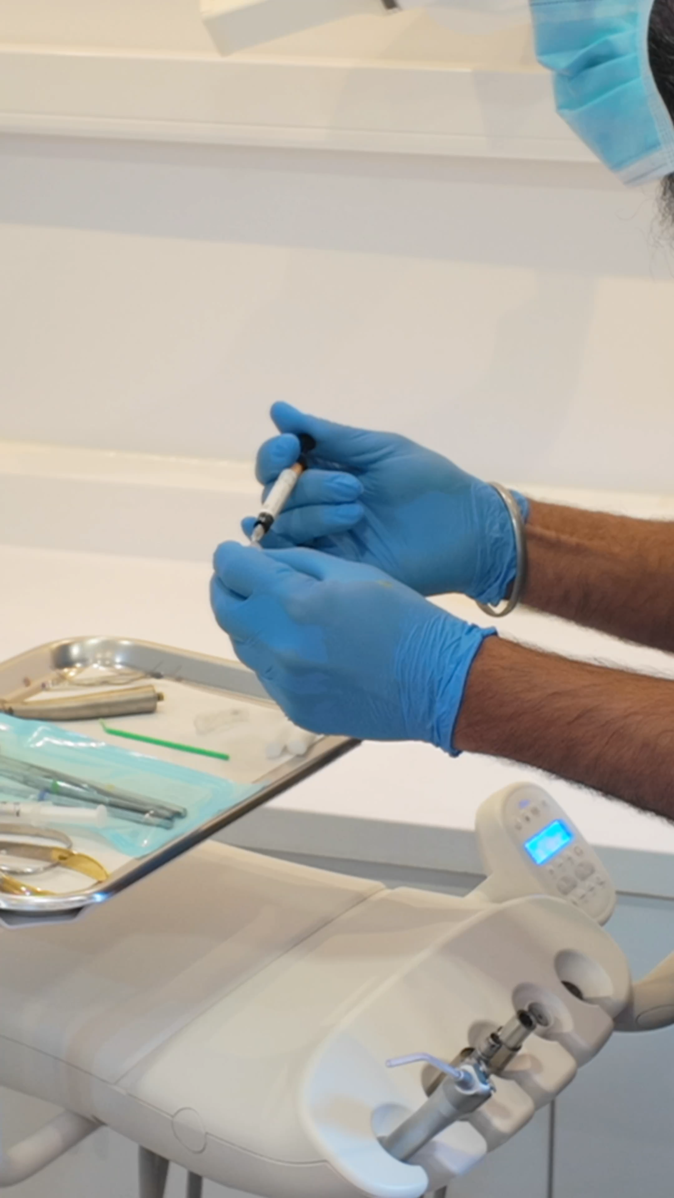 Dentist preparing Inman Aligner appliance